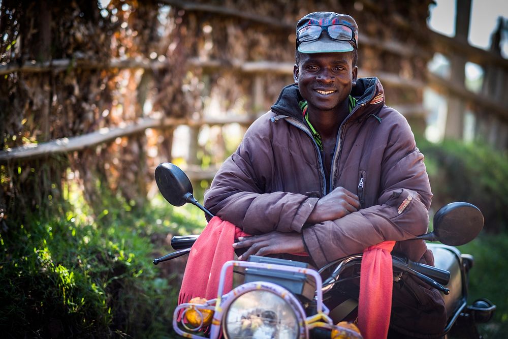 African man on motorbike, Rauben Byamukama, Kikobero, Uganda, September 2017.