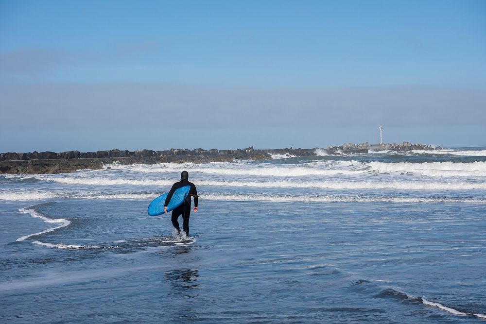 Surfing is popular along the north jetty at Humboldt Bay near Eureka. Original public domain image from Flickr