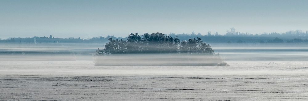 A misty morning layer of vapor flows slowly over Shagawa Lake near the U.S. Department of Agriculture (USDA) Forest Service…