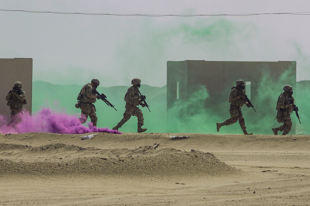 U.S. Soldiers assigned to the 3rd Platoon, Delta Battery, 1st Battalion, 145th Field Artillery Regiment, assault an…