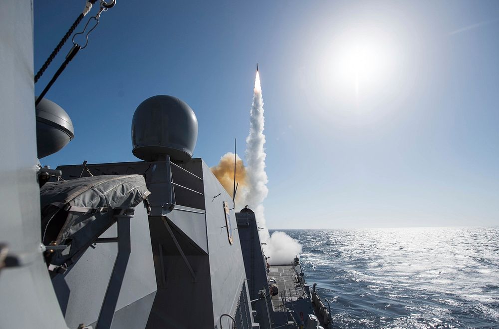 A Standard Missile (SM) 2 launches from the guided-missile destroyer USS Stockdale (DDG 106) during a Live Fire With a…