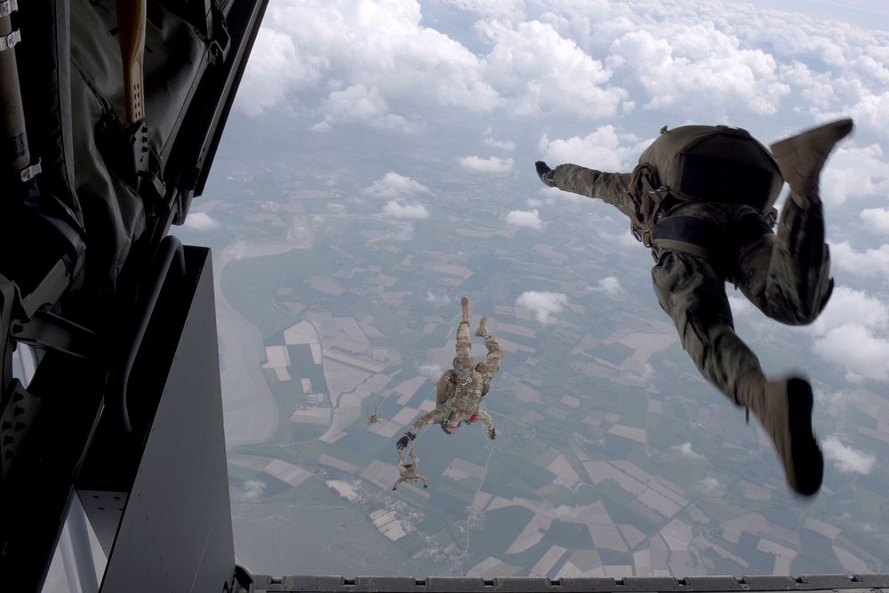 U.S. Army Special Forces members assigned to 10th Special Forces Group (Airborne) perform an airborne operation out of a…