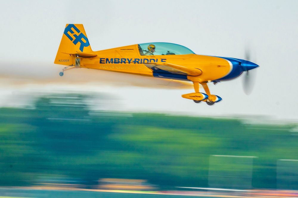 Extra 330 XL performs acrobatics on day one of the week-long AirVenture Oshkosh in Wisconsin, July 23, 2018.