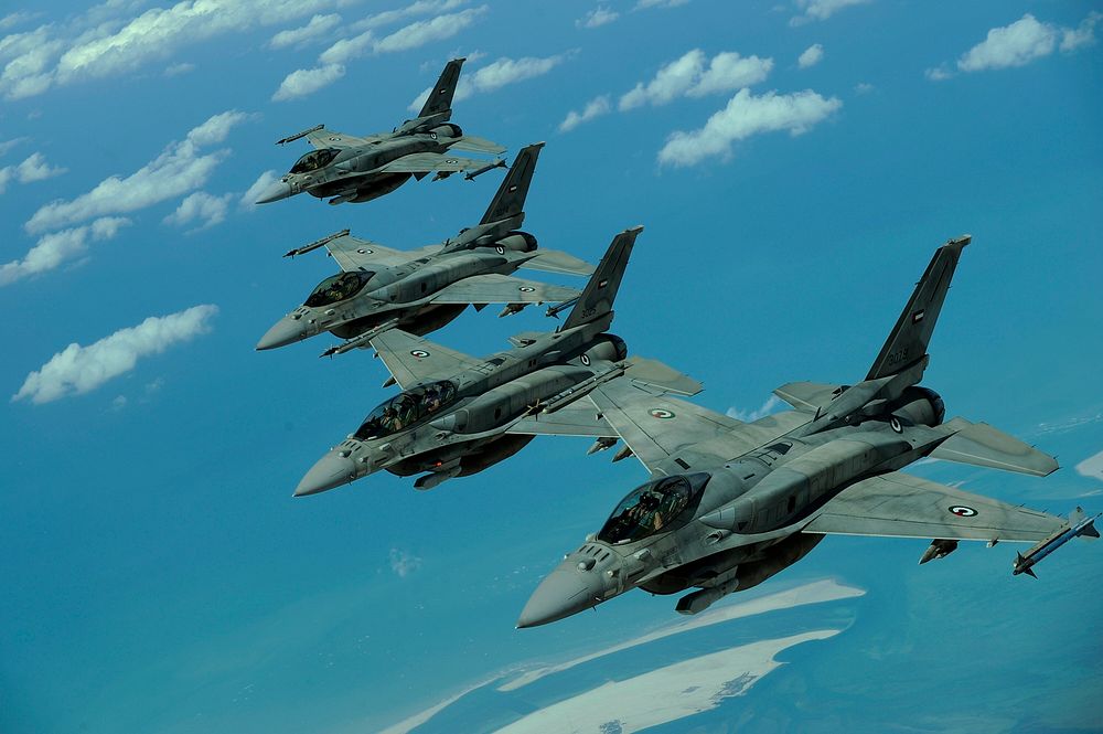 Emirati F-16 Fighting Falcon aircraft fly in formation over Southwest Asia Dec. 9, 2009, during a multinational exercise.