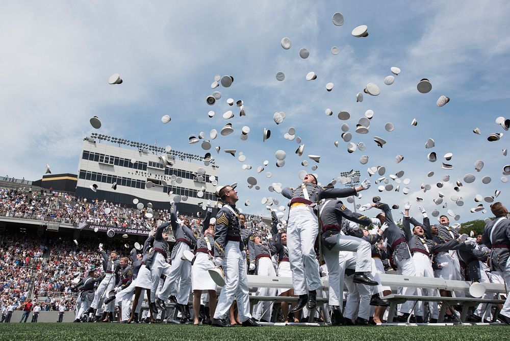 U.S. Military Academy cadets react as their graduation ceremony concludes May 26, 2018, at West Point, New York. U.S. Marine…