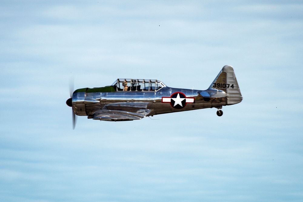 Arctic Thunder Open House July 1, 2018A BT-13 Valiant pilot performs an aerial display during the Arctic Thunder Open House…