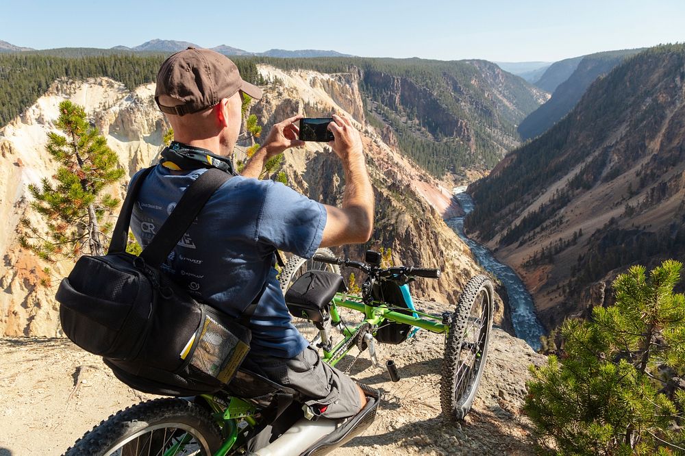 Photographing the Grand Canyon of the Yellowstone from an off-road wheelchair by Jacob W. Frank. Original public domain…