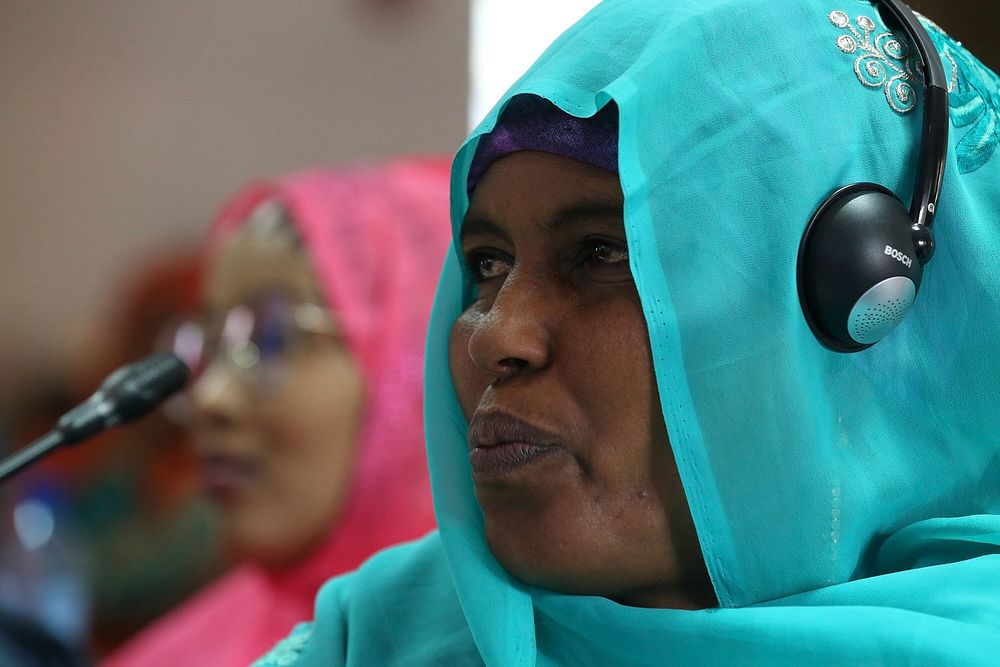 Members of Somalia's South West State Regional Parliament follow proceedings during the closing ceremony of a capacity…