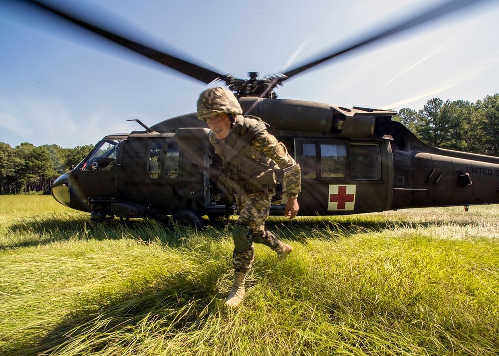 A U.S. Army UH-60 Black Hawk helicopter crew assigned to the South Carolina Army National Guard, Charlie Co., 2-238 Aviation…