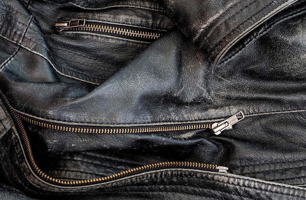 Black worn leather jacket detail 2