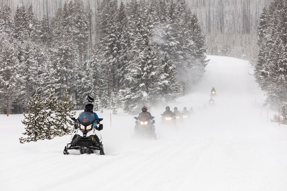 Snowmobile tour headed to the Canyon Village Area by Jacob W. Frank. Original public domain image from Flickr