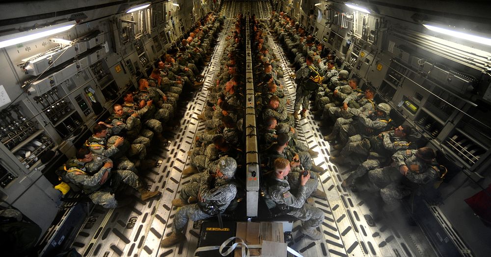 U.S. Army paratroopers wait for takeoff aboard a C-17 Globemaster III aircraft at Pope Air Force Base, N.C., June 21, 2010.
