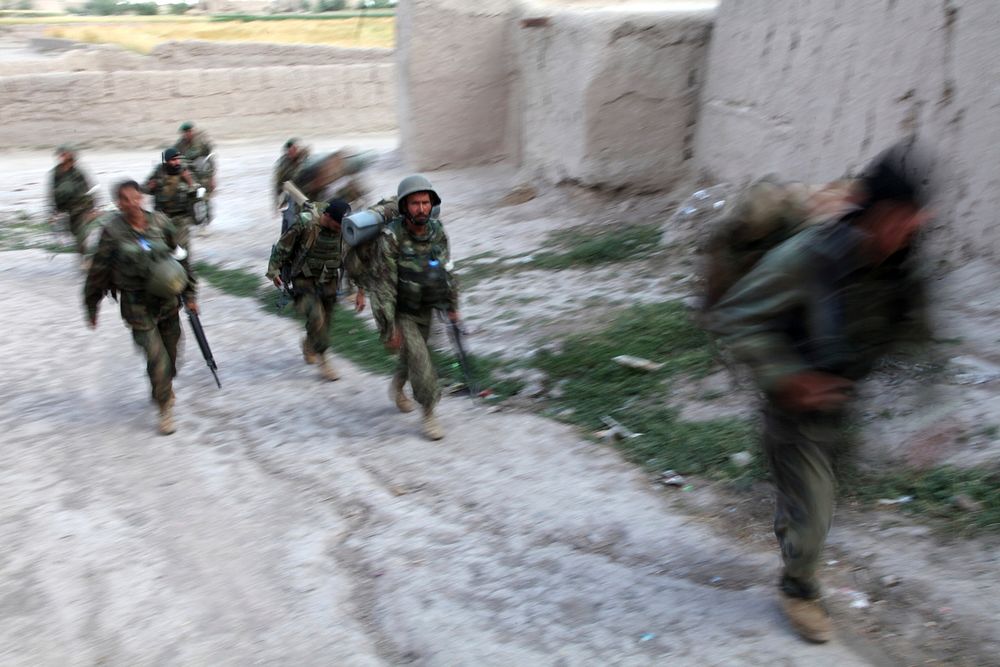 Afghan National Army soldiers move through a qalat during an operation in the in the Zormat district of the Paktya province…