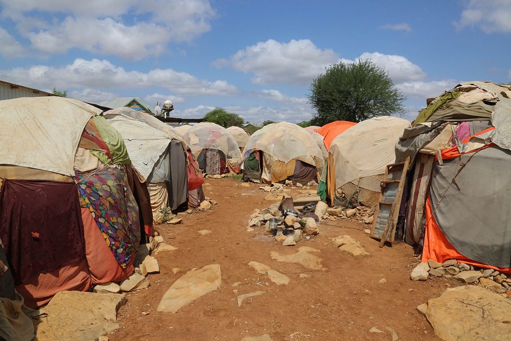 Homesteads within the Howlwadaag Internally Displaced Persons (IDPs) camp in Baidoa, Somalia. Original public domain image…