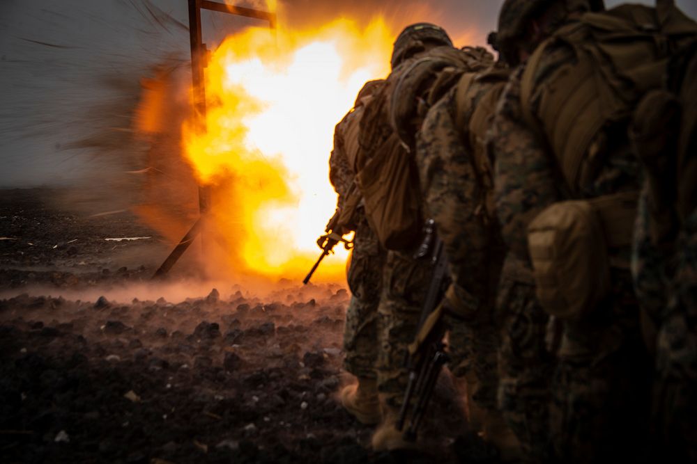 U.S. Marines with Combat Assault Company, attached to 2nd Battalion, 3rd Marine Regiment, conduct demolition breaching…