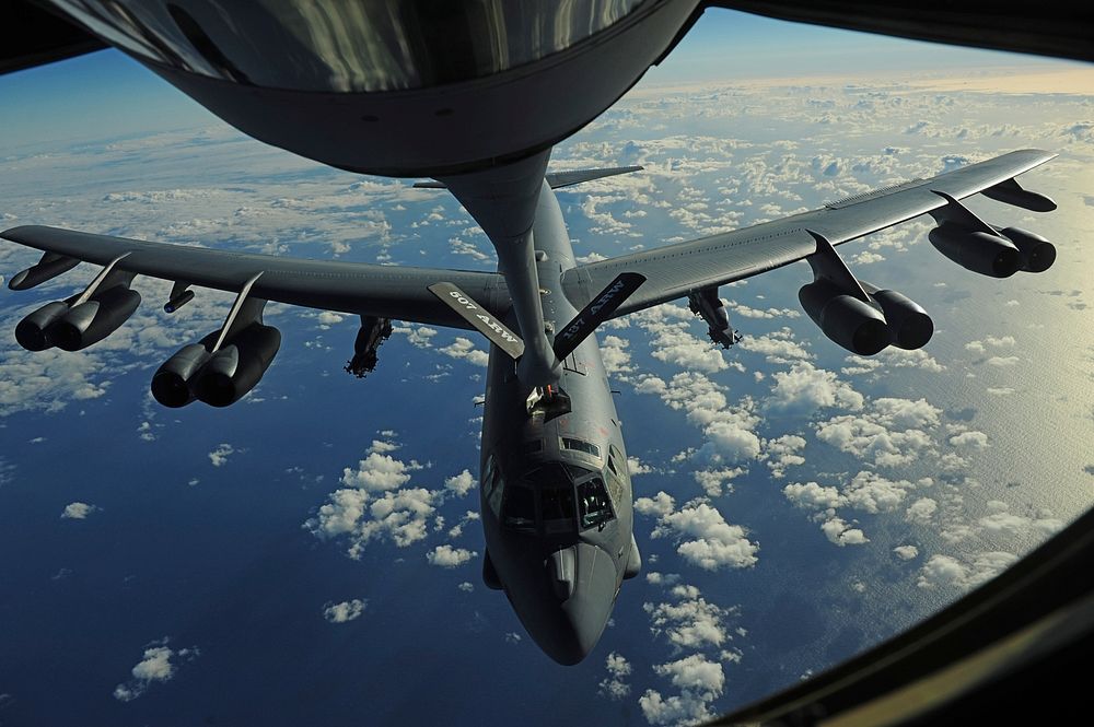A KC-135 Stratotanker aircraft refuels a B-52 Stratofortress aircraft over the Pacific Ocean July 10, 2010, during a sortie…