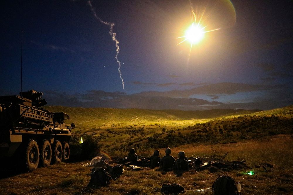 U.S. Soldiers from Alpha Company, 1st Battalion, 111th Infantry, 56th Stryker Brigade Combat Team conduct a night live-fire…