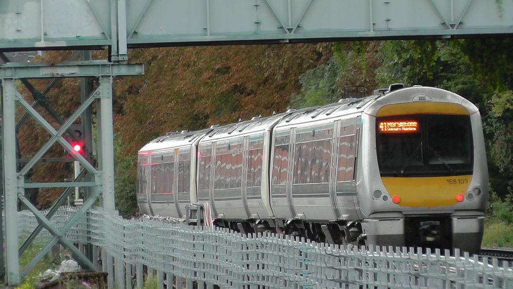 Class 168 Turbostar train passing what I feel sure is West Hampstead station.