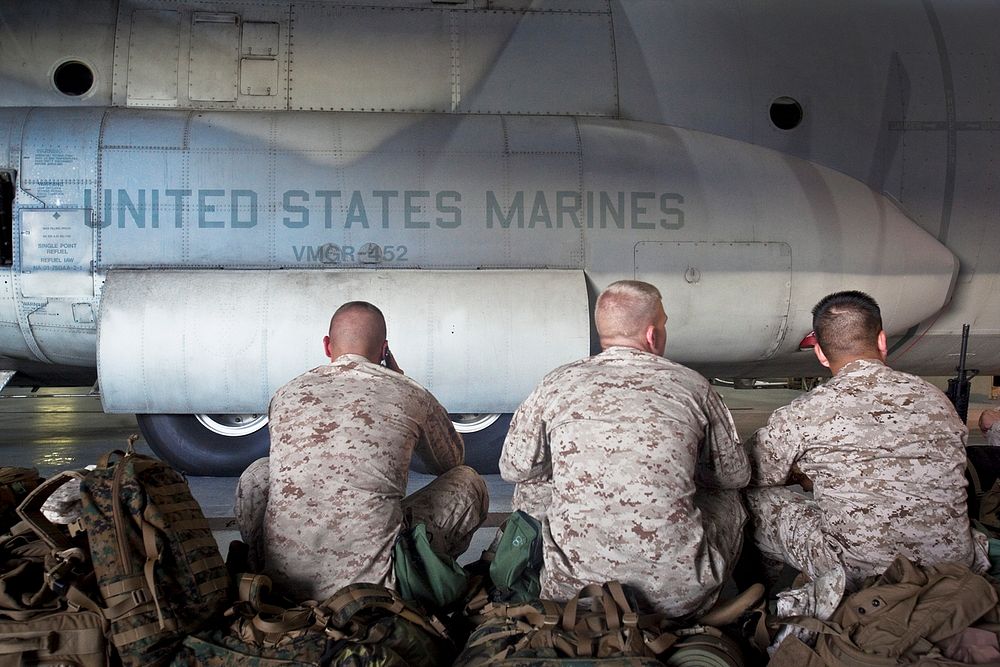 Marines wait to board plane to Africa