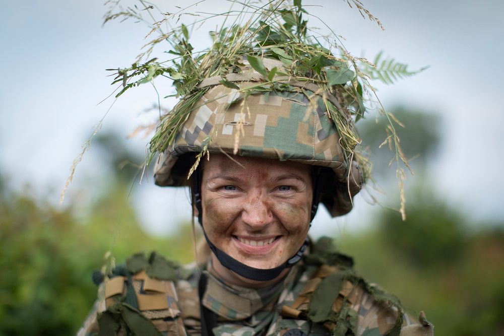 A Latvian Soldier from the Latvian National Guard’s 2nd Brigade, 25th Infantry Battalion stands for a portrait before…