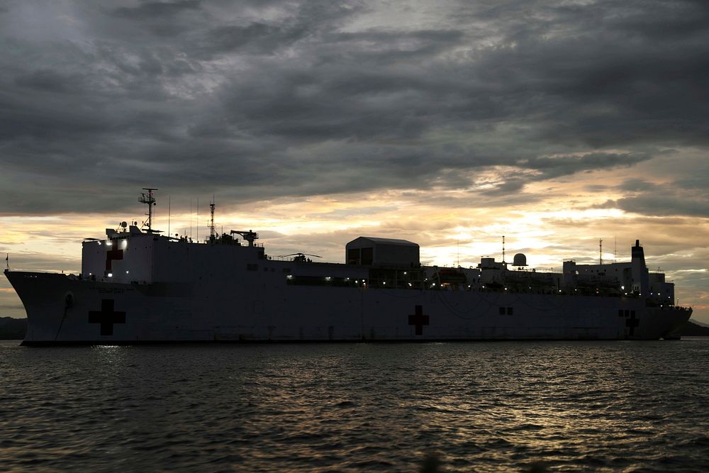 The U.S. Navy hospital ship USNS Comfort (T-AH 20) is anchored outside of Puntarenas, Costa Rica during the ship's medical…