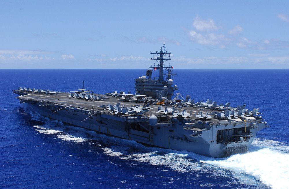 The aircraft carrier USS Ronald Reagan (CVN 76) transits the Pacific Ocean July 24, 2010, during Rim of the Pacific (RIMPAC)…