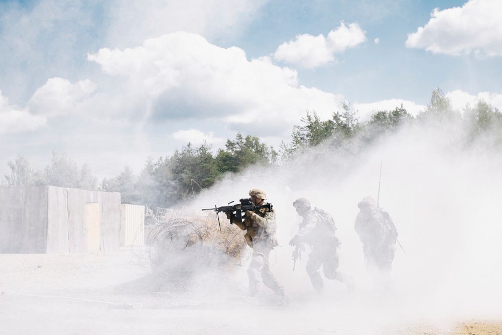 U.S. Army paratroopers assigned to 1st Battalion, 503rd Infantry Regiment, 173rd Airborne Brigade quickly move towards an…