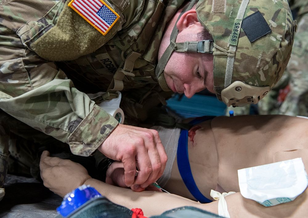 '1 Geronimo' medics practice tactical combat casualty careArmy Sgt. Spencer Robinson, a combat medic specialist assigned to…