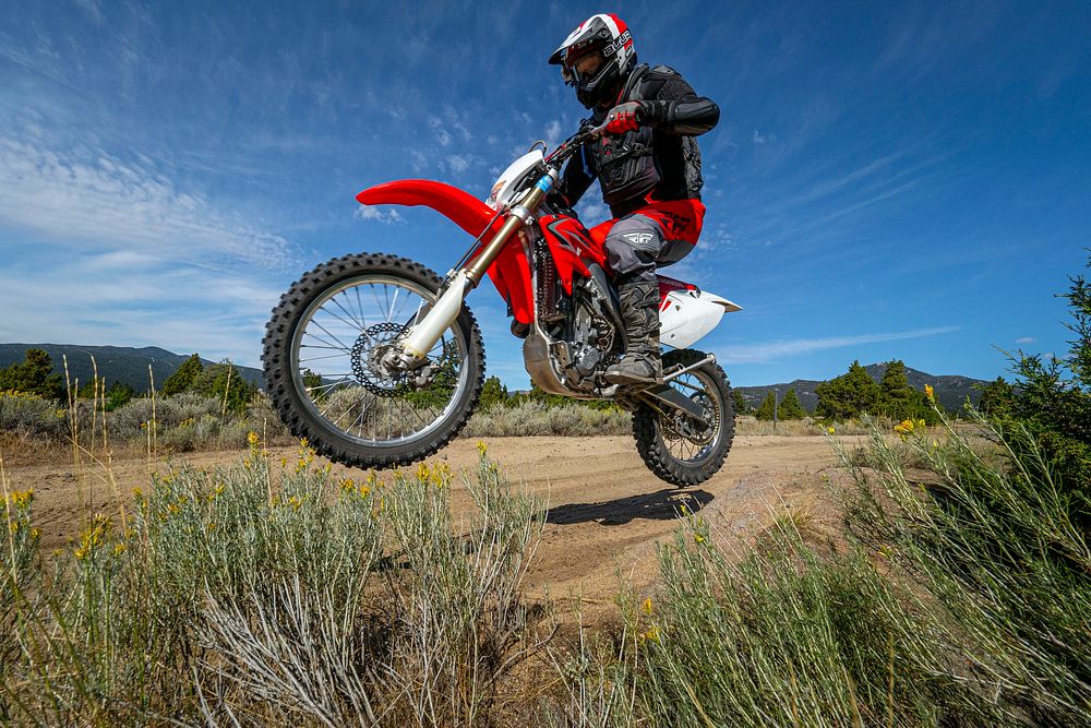 Off-highway vehicle (OHV) enthusiasts ride take to the Pipestone trailhead of Whitetall Mountains in the Butte Ranger…