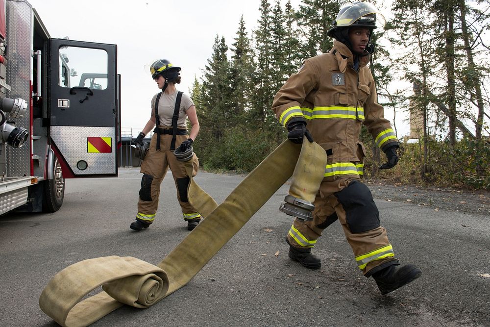 CE Airmen demonstrate fire protection capabilities at JBERU.S. Air Force fire protection specialists with the 673d Civil…