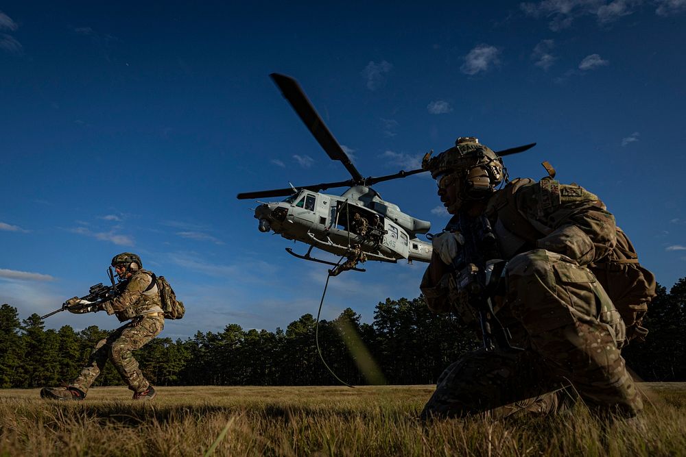 Special Warfare Airmen with the New Jersey Air National Guard’s 227th Air Support Operations Squadron fast rope from a UH-1Y…