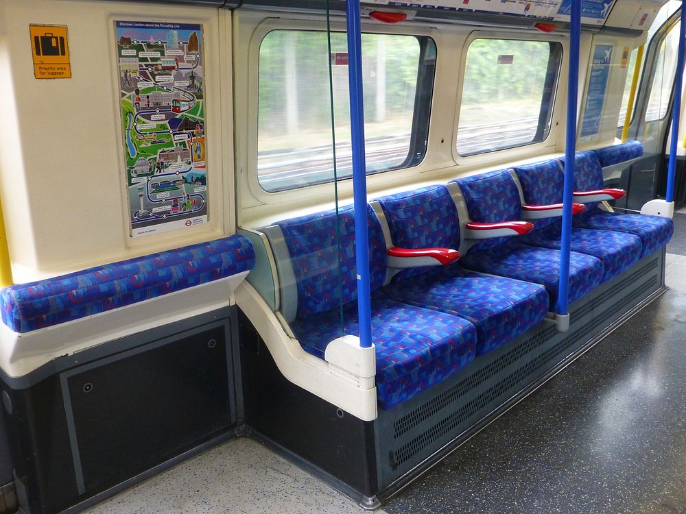 One of several images showing the variations in colour of the 'Barman' design seats inside London Underground Piccadilly…