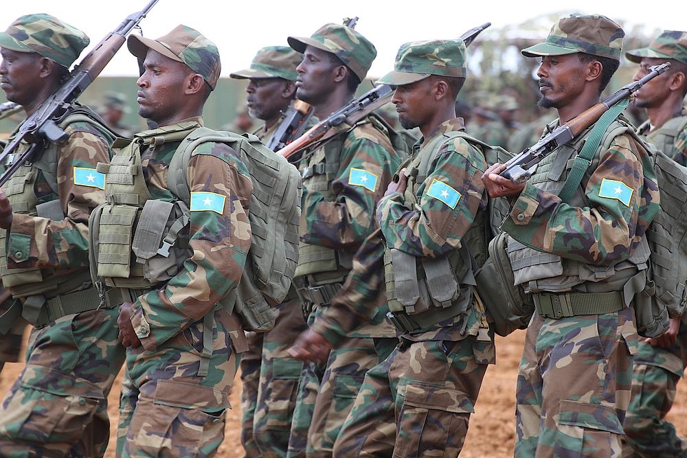 Soldiers belong to Somali National Army (SNA) demonstrate skills they have acquired during a pass out ceremony held in…
