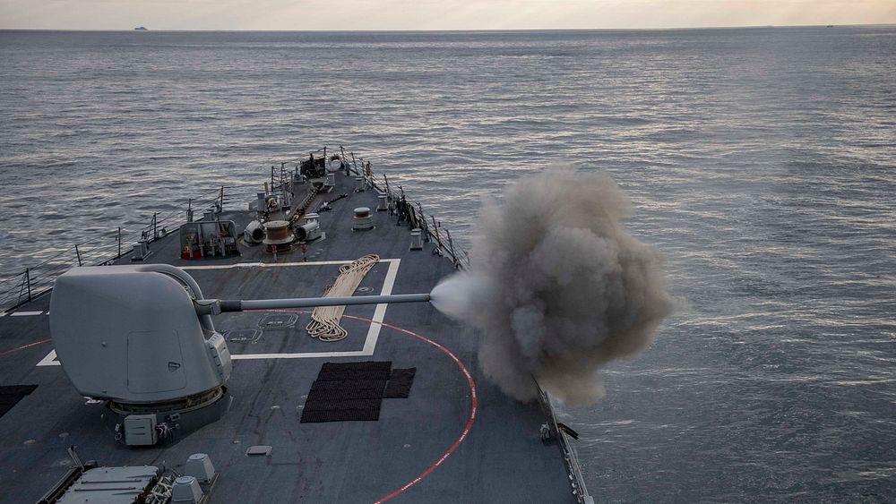 ATLANTIC OCEAN (Dec. 4, 2019) - The Arleigh Burke-class guided-missile destroyer USS Carney (DDG 64) fires its Mark 45 5…