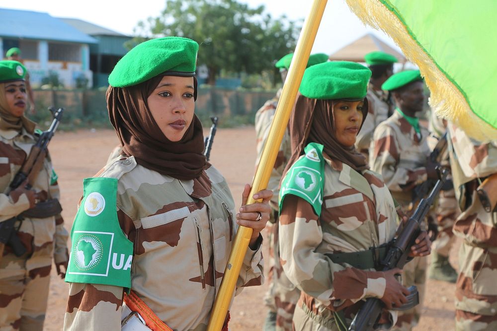 Djiboutian soldiers serving under the African Union Mission in Somalia (AMISOM), stand on parade in honour of their Outgoing…