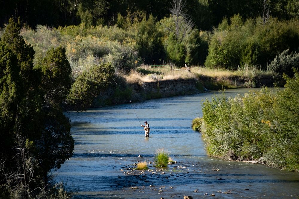 Fly fishing in the Ruby River, downstream of Ruby Reservoir and Dam, near P&J Ranches where Producer Steve Burke (black…