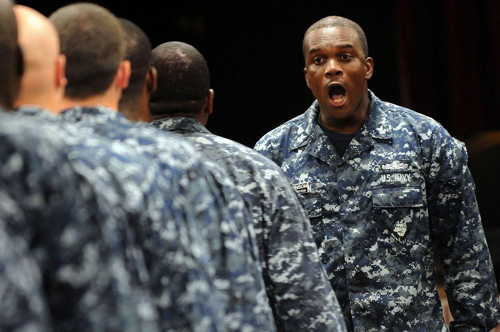 U.S. Navy chief petty officer selects march in to attend an all-hands call with Master Chief Petty Officer of the Navy Rick…