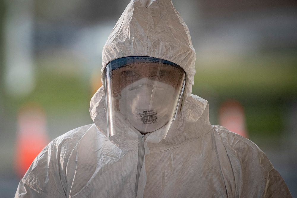 A medical technician pauses between patients at a COVID-19 Community-Based Testing Site at the PNC Bank Arts Center in…