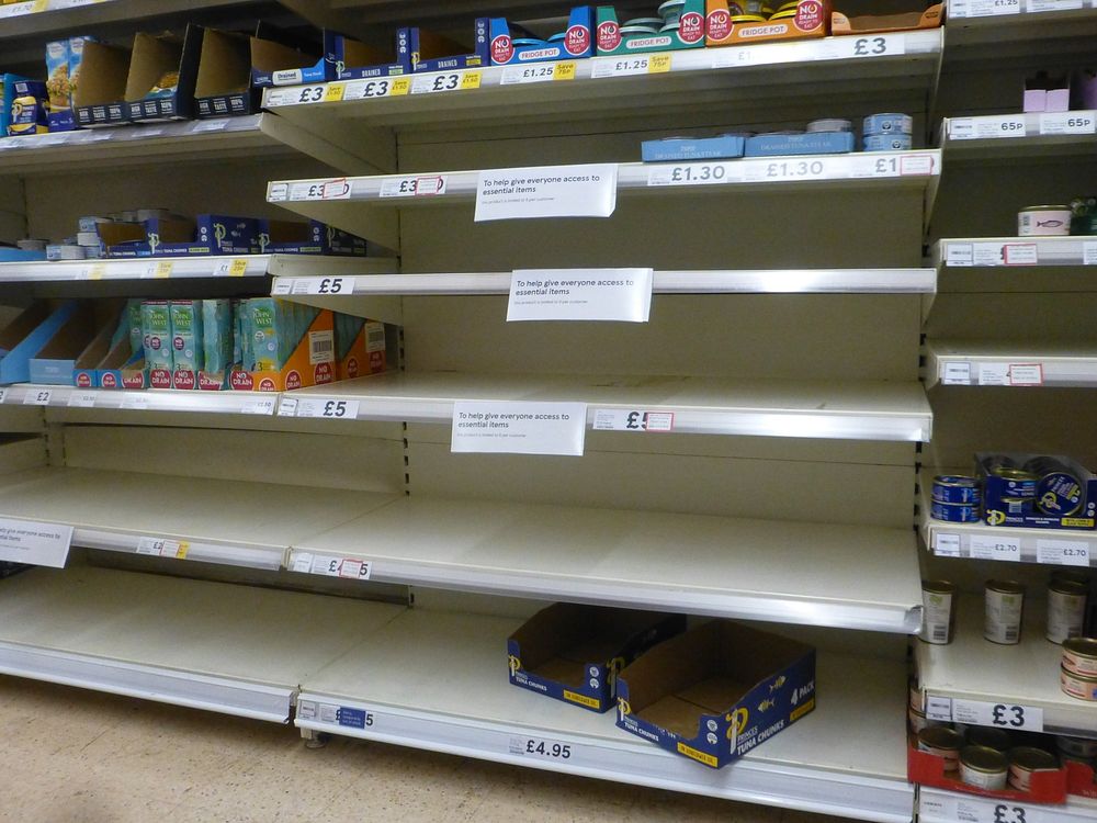 Empty shelves plus signs that the retailer was rationing sales of these products in a supermarket during the spring 2020…