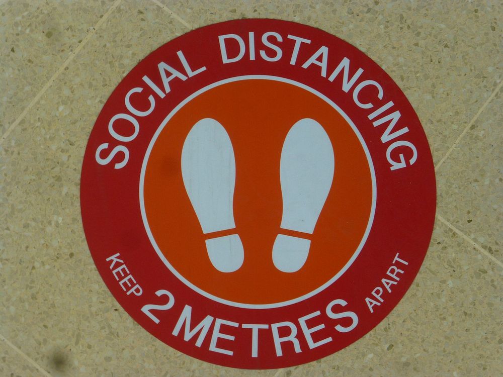 Social distancing floor sign during the spring 2020 Covid-19 pandemic - these signs were replaced when the indoor shopping…