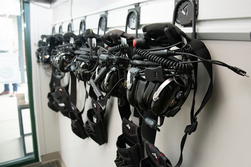 Headsets hang ready for aircrew the grab and go to assigned aircraft at
