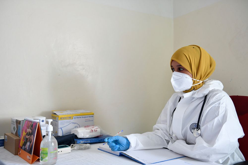 A medical officer at De Martini Hospital in Mogadishu on 21 June 2020. UN support for Somalia's COVID-19 response includes…