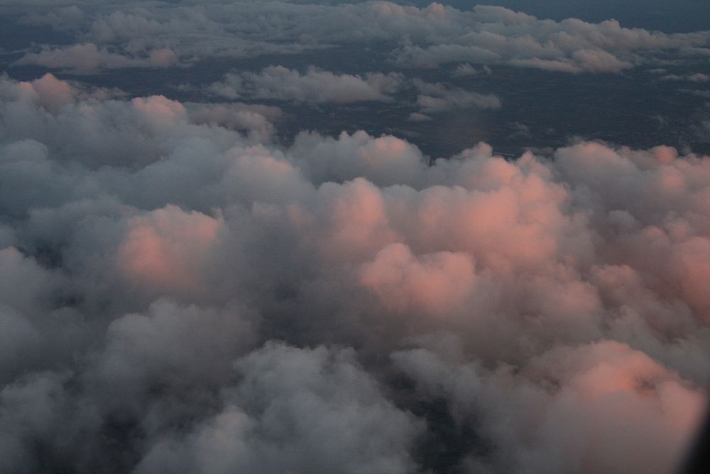 Homeward bound.Pink clouds on the way from Amsterdam to Liverpool. A lovely, lovely flight. Original public domain image…