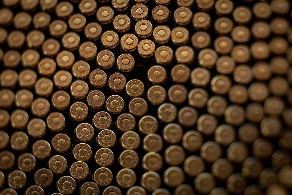 Machine gun brass piles. Original public domain image from Flickr