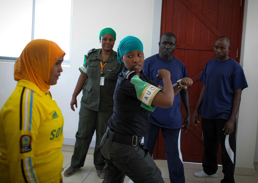 Female members of Mogadishu neighbourhood watch teams practise during a training programme designed by the African Union…