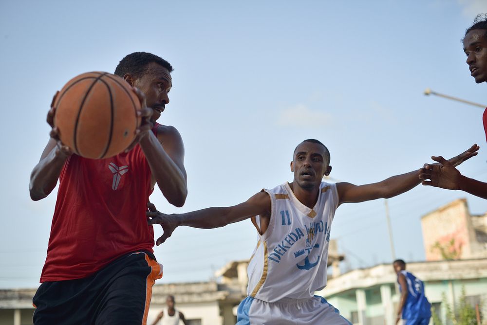 Basketball players play a game on a court in Mogadishu, Somalia, on 6 July 2013.