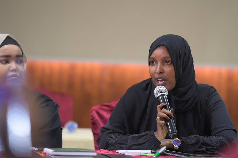 A participant speaks during women's political representation forum organised by the office of Political Affairs of the…