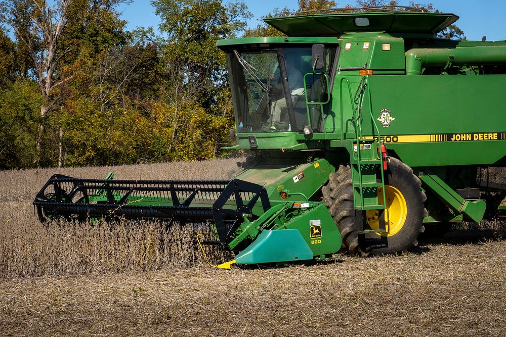 A farmer harvests a soybean field near New London, Md., October 17, 2020.USDA/FPAC photo by Preston Keres. Original public…