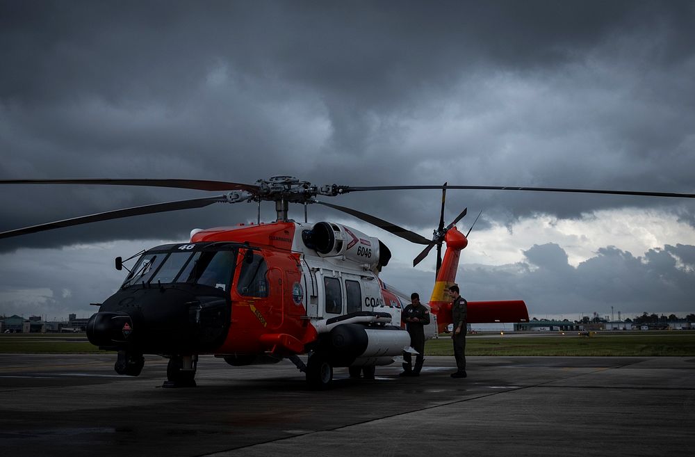 Helo Before StormNew Orleans, L.A. (October 23, 2020) A U.S. Coast Guard helicopter cools down after a mission supporting…