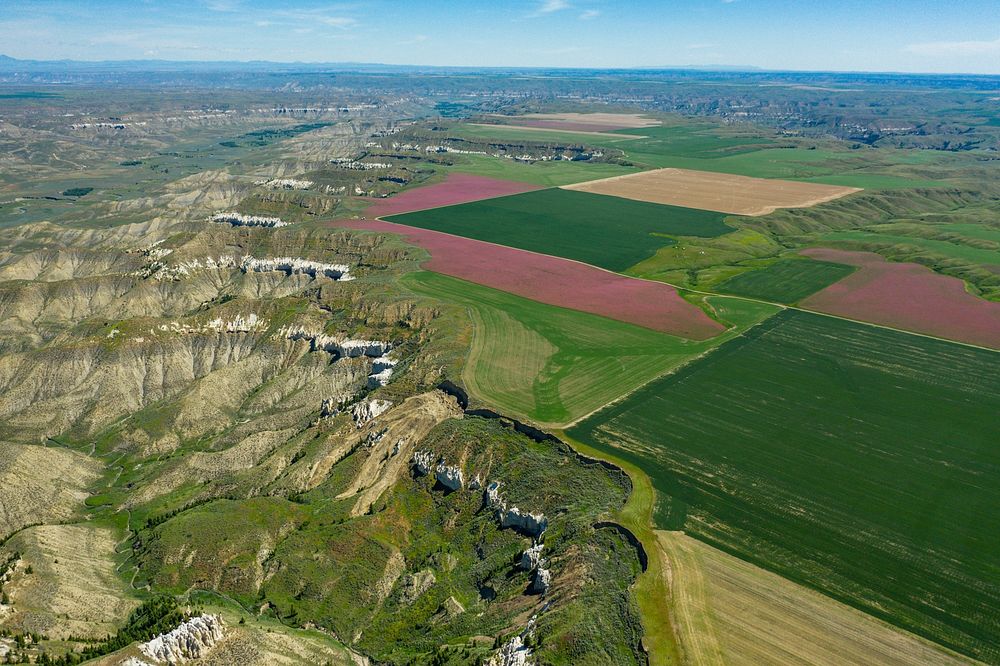 Arrow Creek Breaks bordering Linker Farms. Judith Basin County, Montana. June 2020. Original public domain image from Flickr